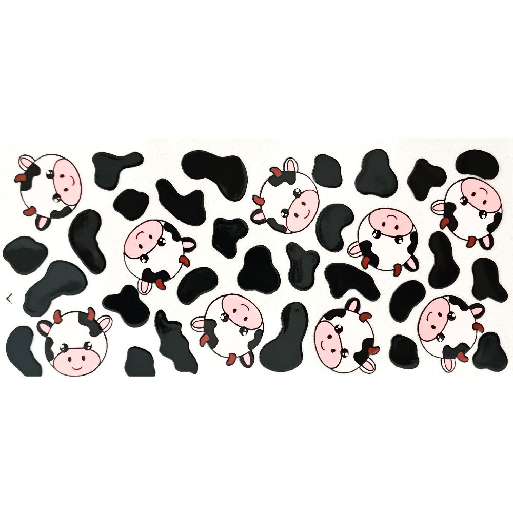 Cute cartoon cow faces with black cow spots on a white background
