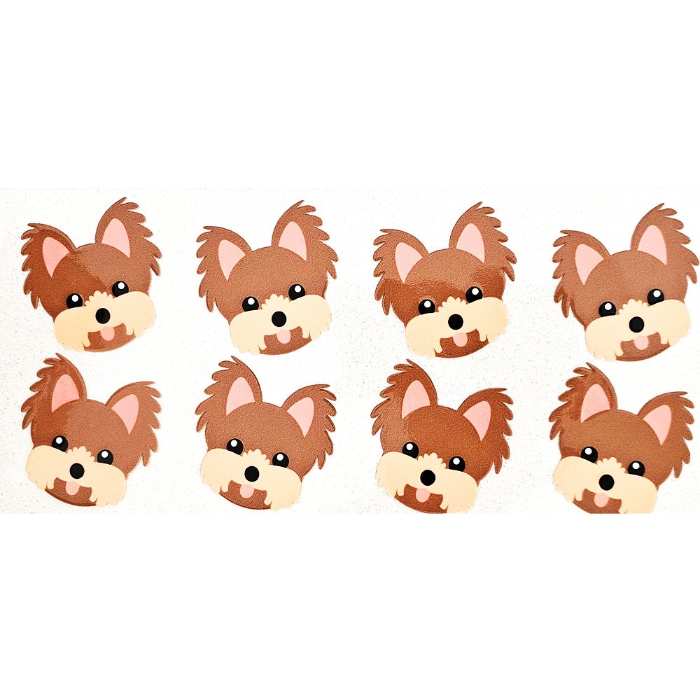 Cartoon Yorkshire Terrier face vinyl decals with light beige snouts and cute black eyes on a white background