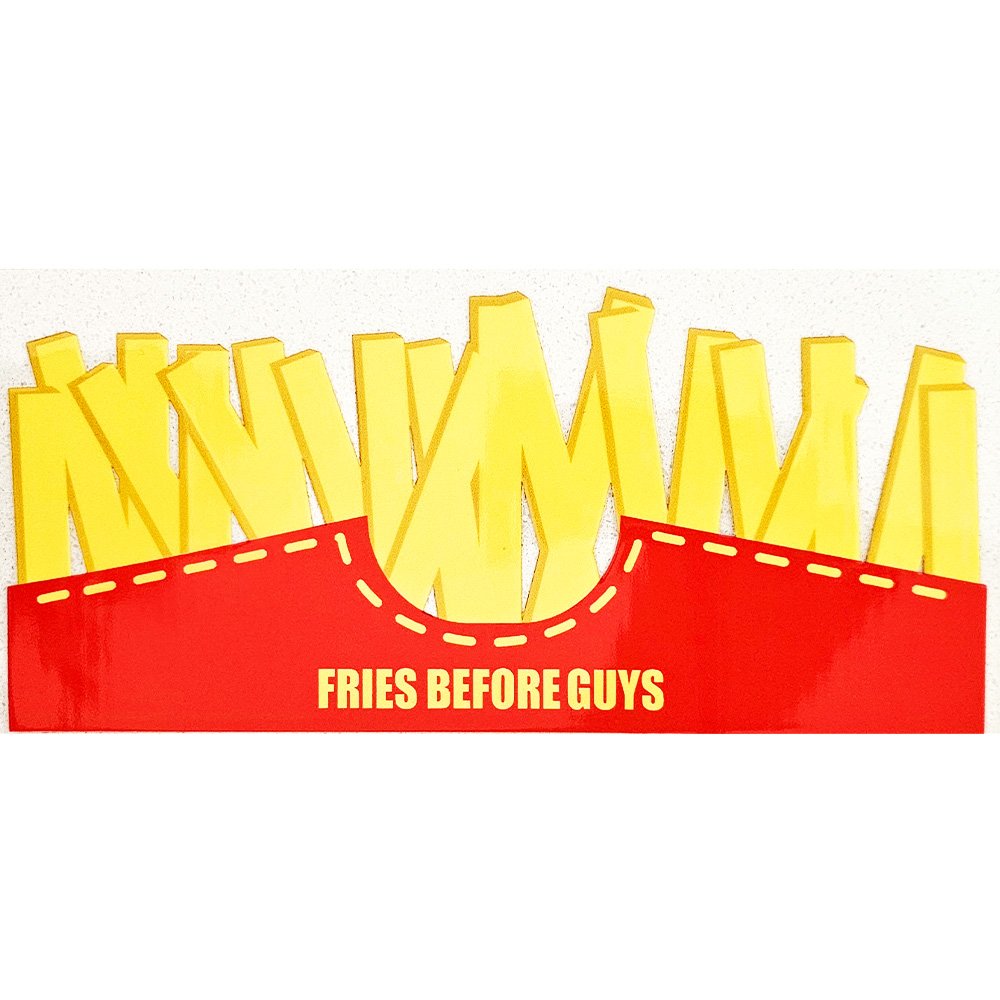 Yellow french fries in a red carton with the phrase "Fries Before Guys"