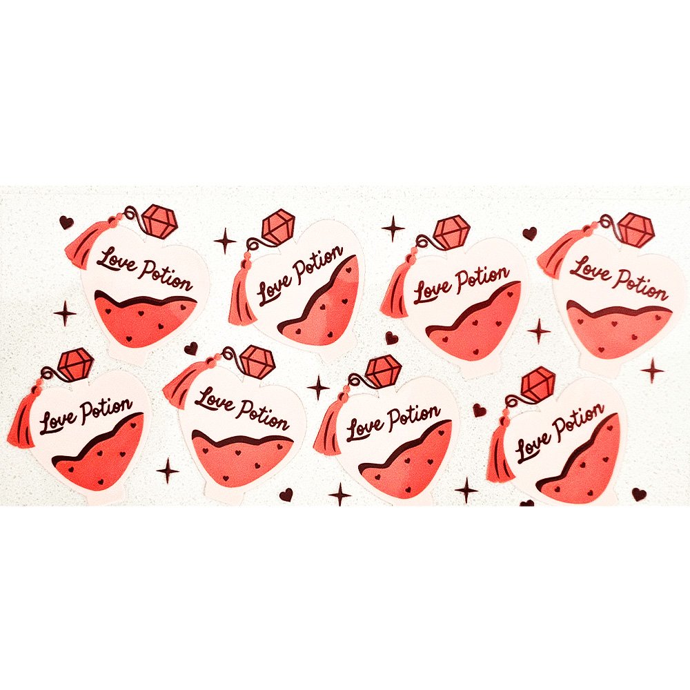 Cute “Love Potion” heart-shaped bottle decals with pink liquid, tassels, and red gem accents in a playful pattern.