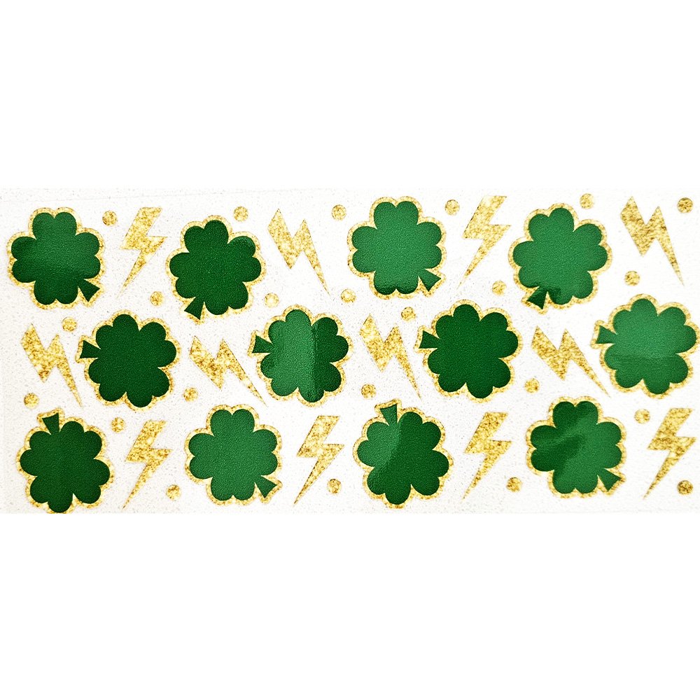 Sticker sheet featuring bold green clovers and glittery gold lightning bolts on a white background.