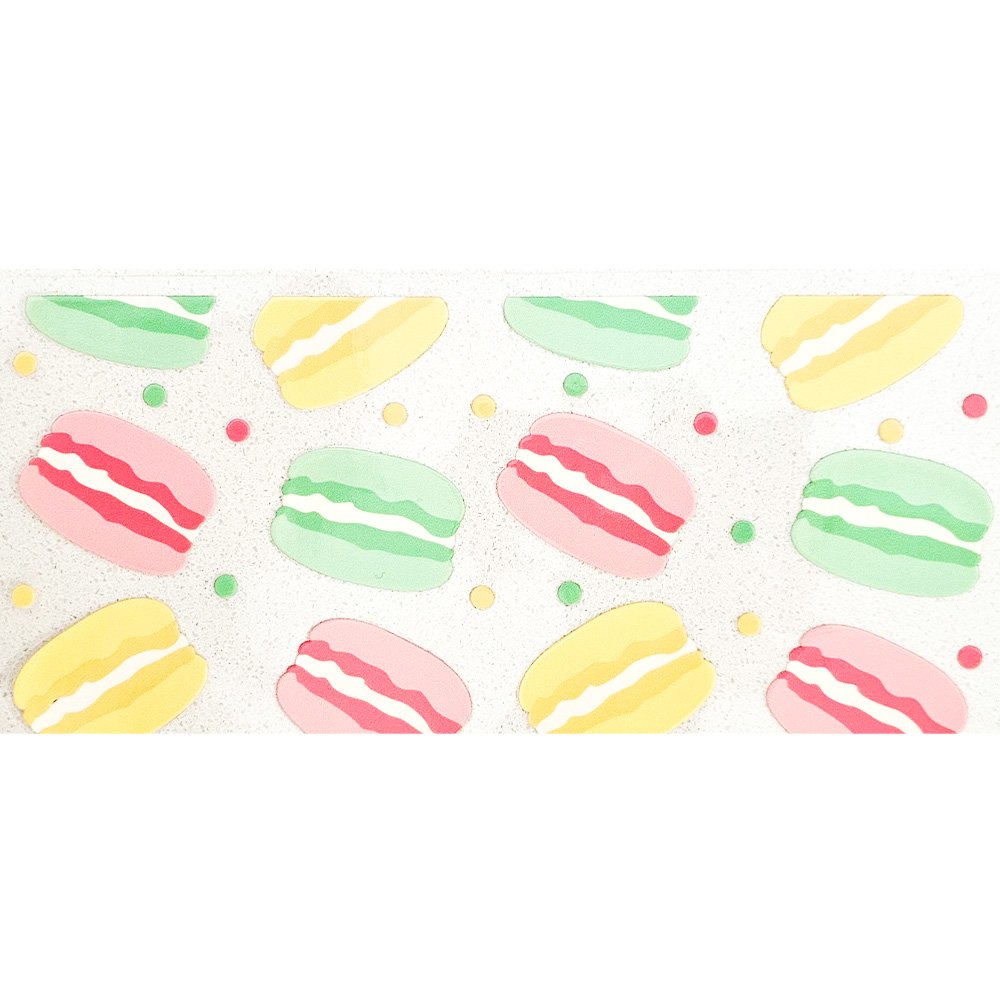 Cute pastel macaron stickers in pink, yellow, and green with dotted confetti on a white background.
