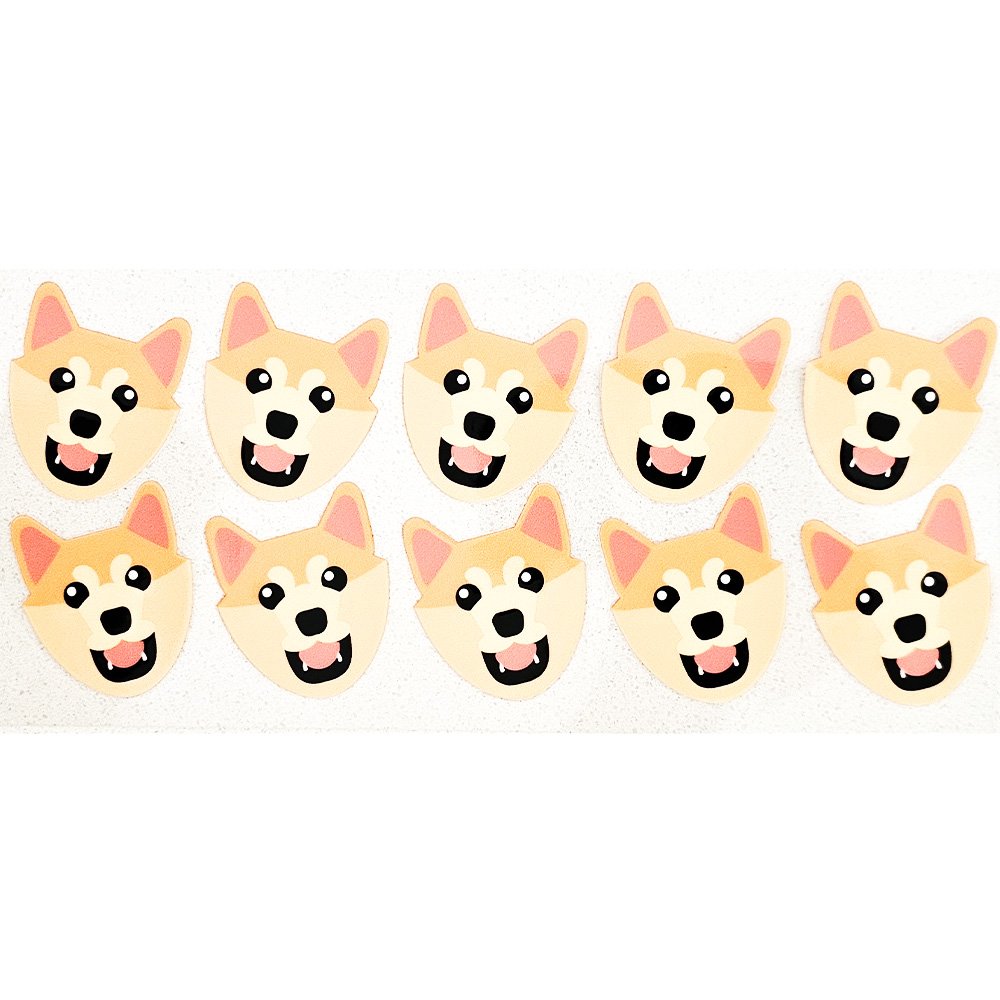 Cute Shiba Inu dog face stickers with happy expressions in a repeating pattern on a white background.