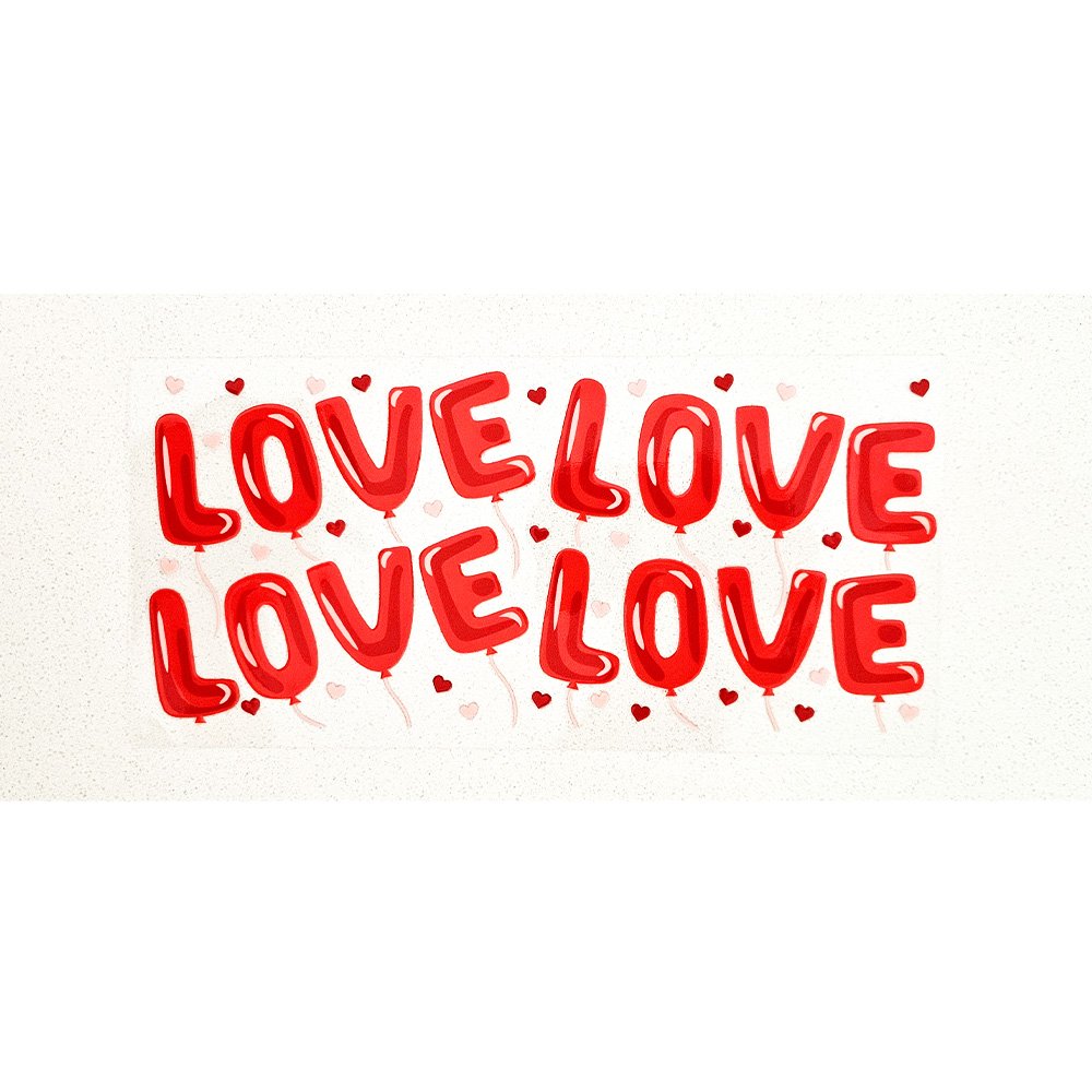 Red balloon letter decals spelling "LOVE" with floating heart accents on a white background
