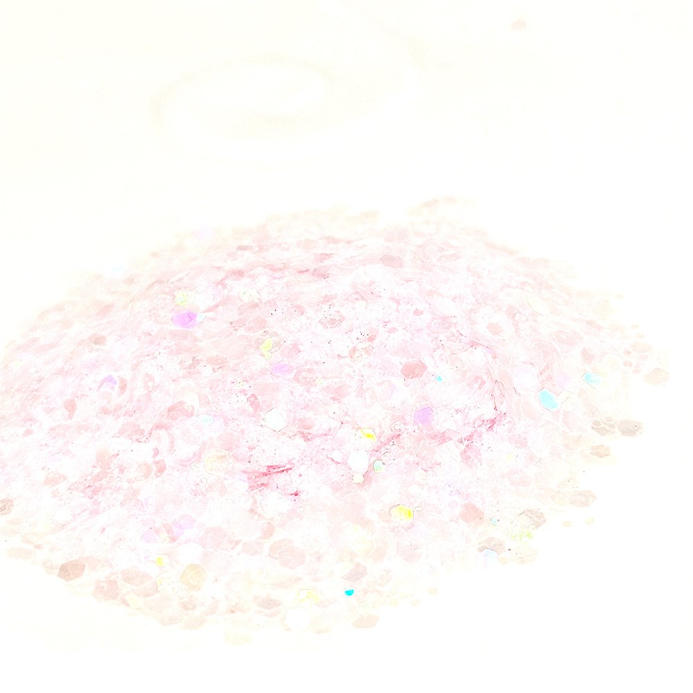 Pale pink iridescent chunky glitter with subtle rainbow shimmer on a light background