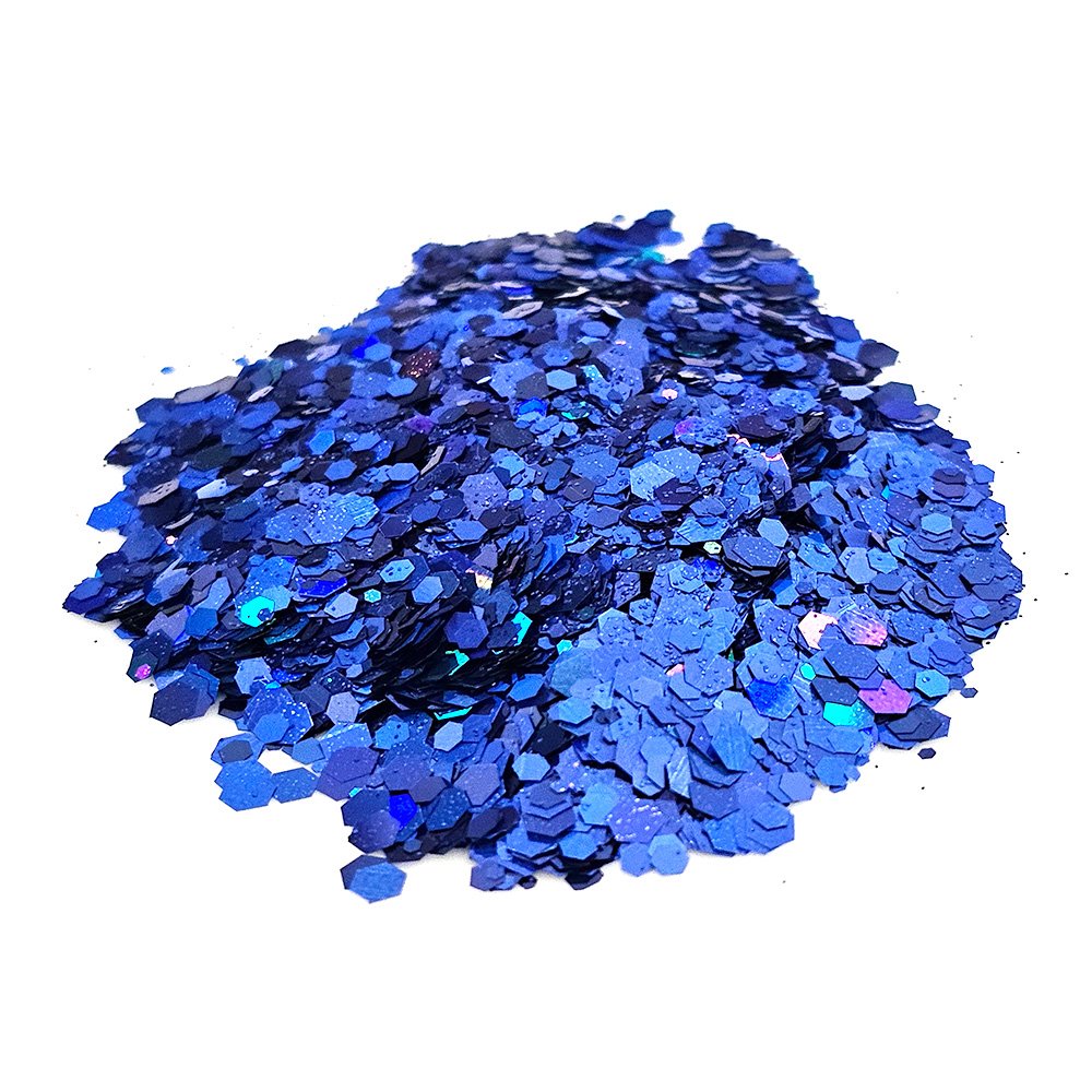 Deep royal blue chunky glitter with iridescent sparkle on a white background