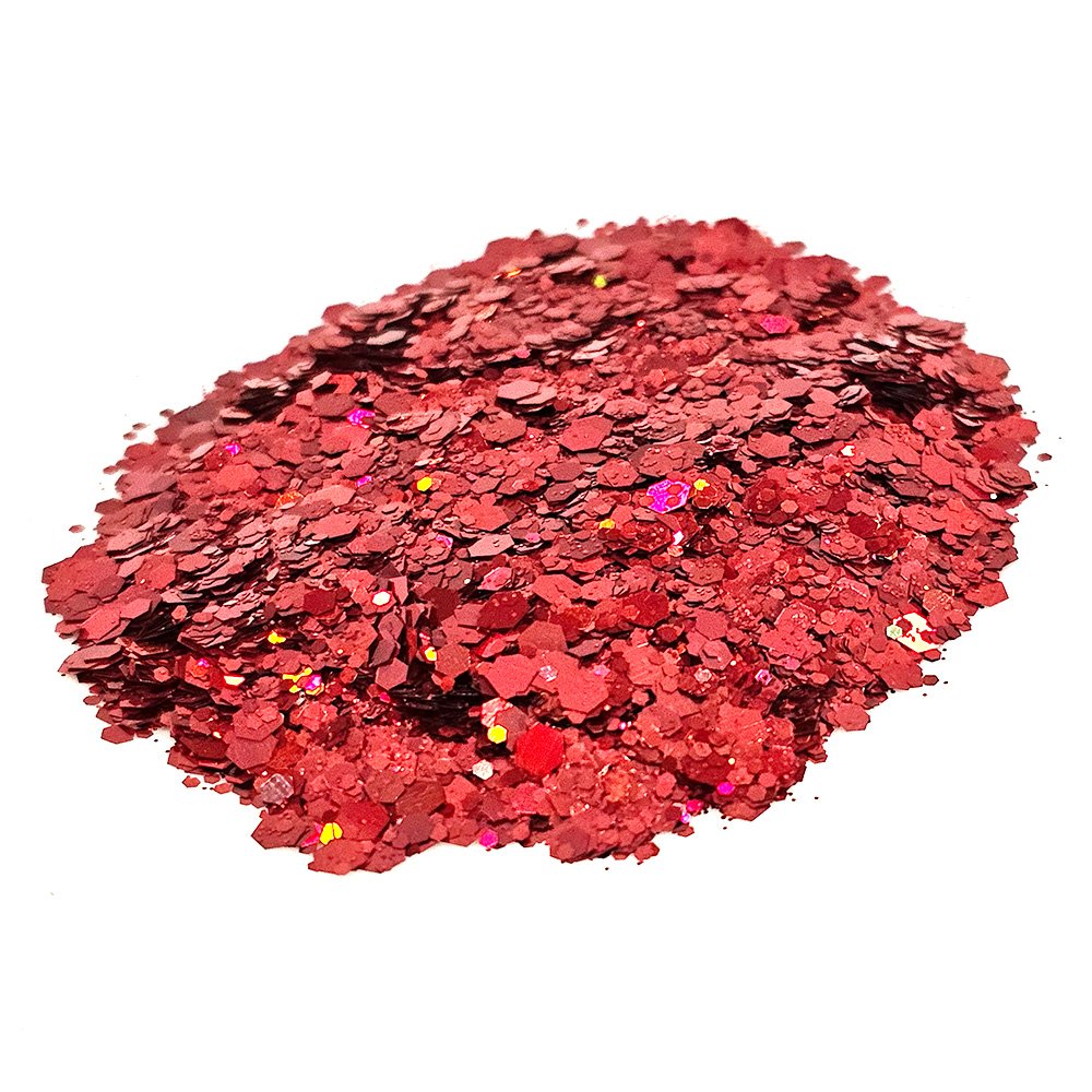 Bright red chunky glitter with mixed sizes and holographic sparkle on a white background