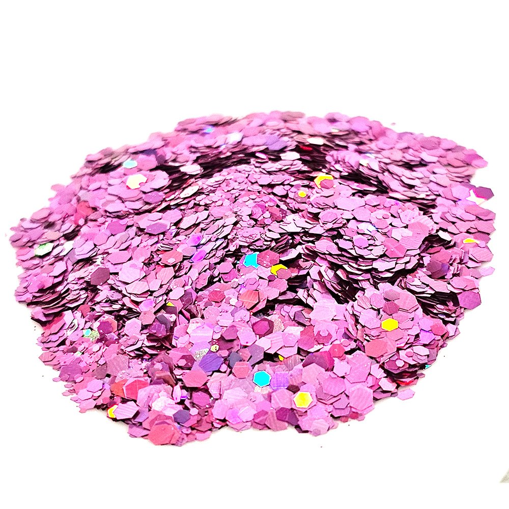 Bright pink chunky glitter with holographic sparkle on a white background