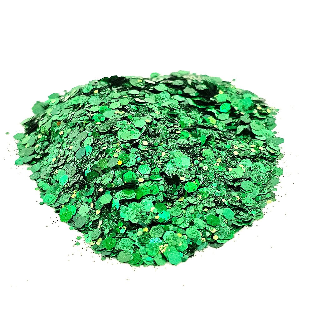 Bold emerald green chunky glitter with reflective shimmer on a white background