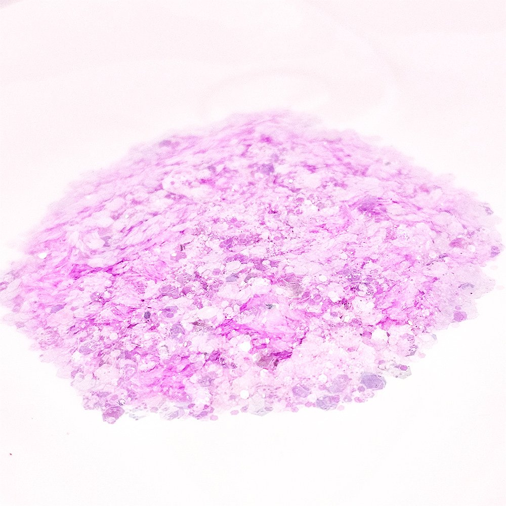 Light lilac pink iridescent chunky glitter with soft shimmer on a white background