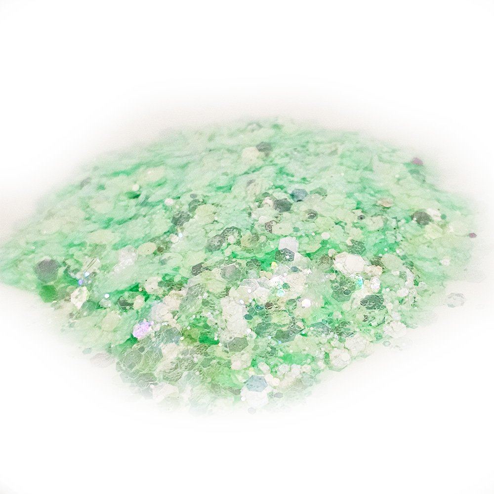 Pastel mint green chunky glitter with iridescent shimmer on a white background