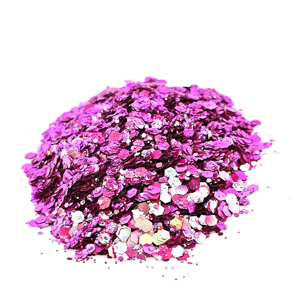 Bright magenta and silver chunky glitter mix with reflective shine on a white background