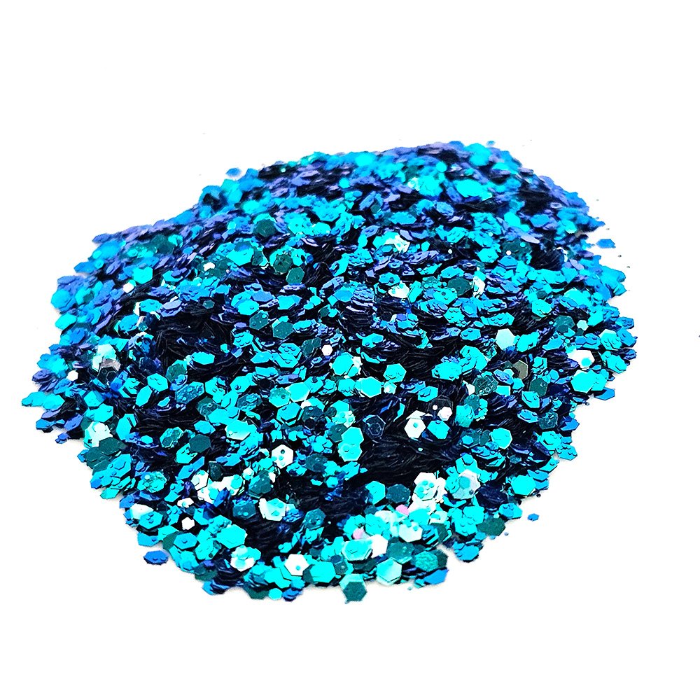 Teal and deep blue chunky glitter mix with high shine on a white background