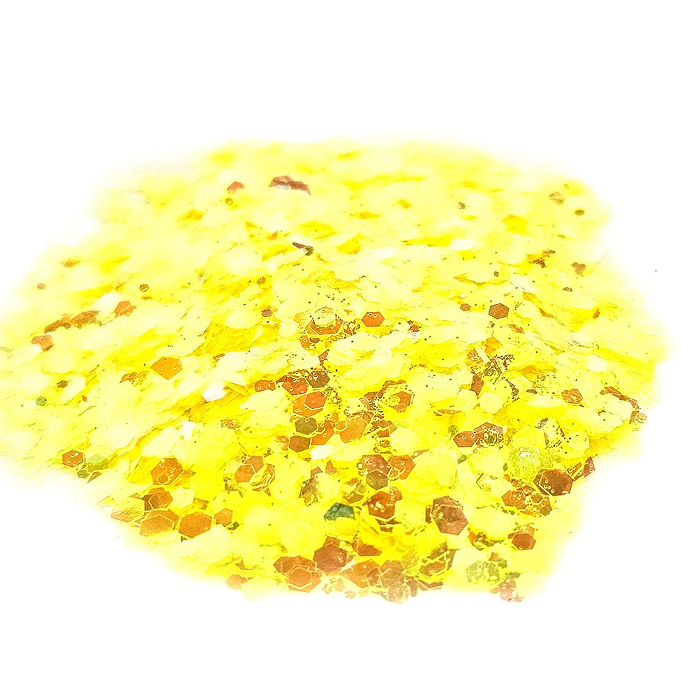 Vibrant yellow chunky glitter with golden shimmer on a white background